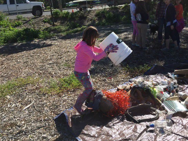 Kid picking up trash